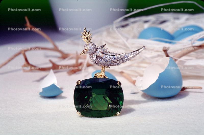 Silver Bird, perched, Green Jade Ring, Blue eggs, paper nest, jewelry, twigs