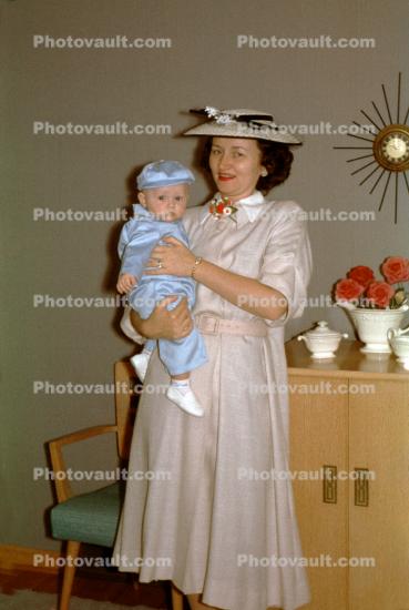 Mother with her Baby Boy, formal dress, 1950s