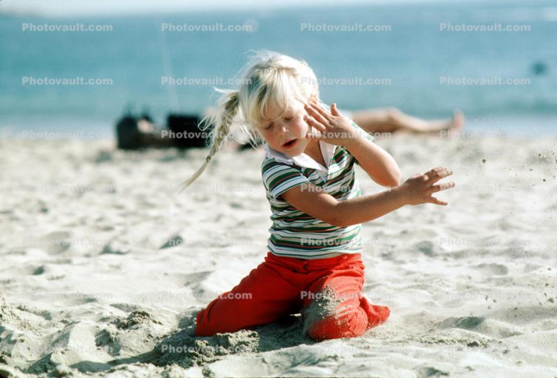 Girl Playing on the Beach
