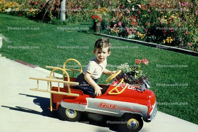 Boy, Pedal Car, ladder, steering wheel, 1950s