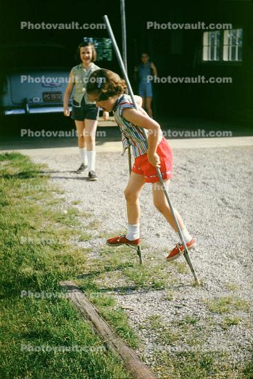 Girls, Stilts, walking, Akron Ohio, 1950s