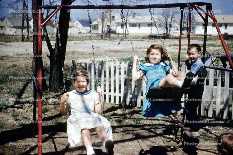 swing set, backyard, smiles, Akron Ohio, 1950s