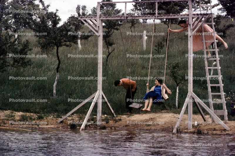 Swing into the water, ladder, gym set, 1950s