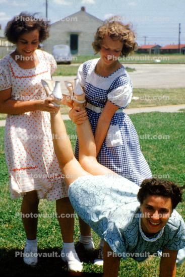 girls, wheelbarrow, formal dress, fun, smiles, dresses, 1950s