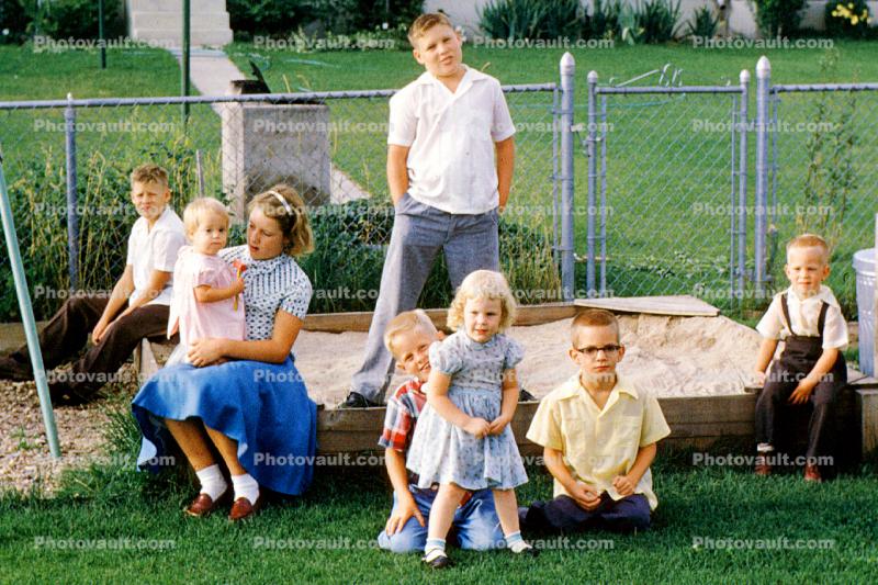 Backyard, sandbox, boys, girls, slide, July 1958, 1950s