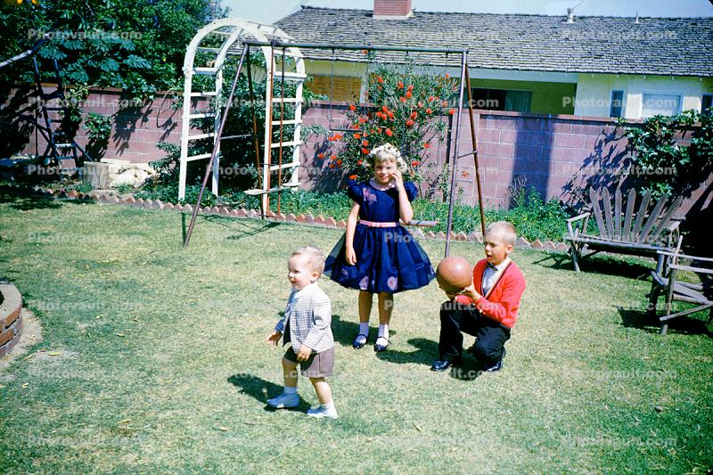 Girl, boys, ball, formal dress, Backyard, April 1960, 1960s