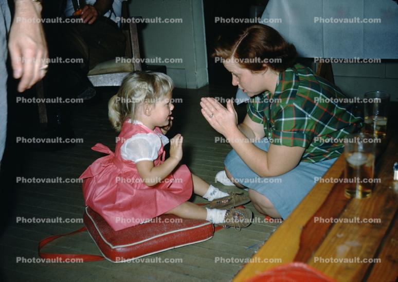 Playing Patty-Cake, hands, arms, dress, Mom, Daughter, 1950s