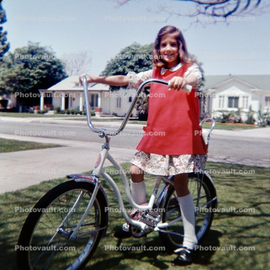 Girl on a Stingray Bicycle, Houses, street, 1960s