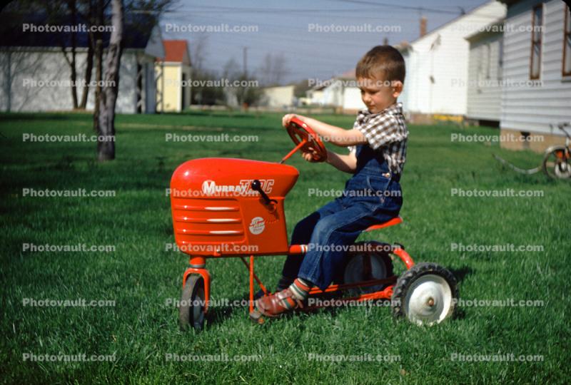 Boy on a Murray Trac Peddle Car, Lawn, 1950s