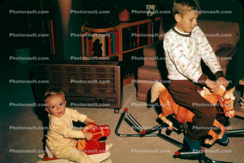 Boys with their rocking horses
