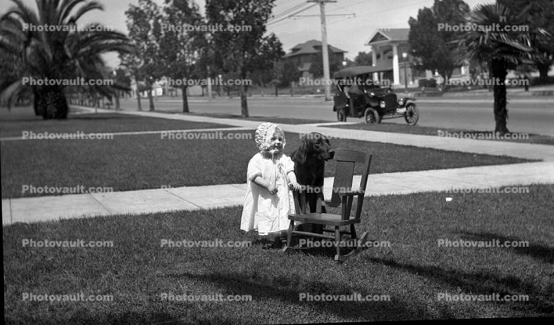 Girl, Chair, Dog, costume, car, sidewalk, frontyard, 1930's