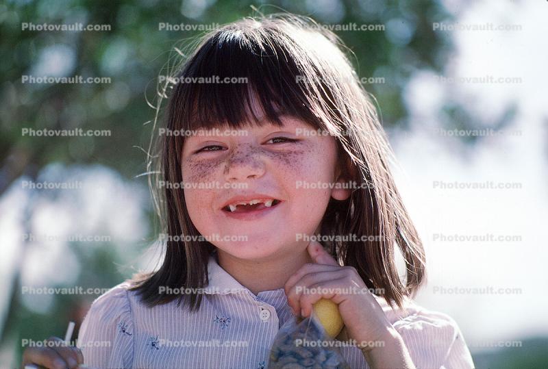 Smiling Girl, missing-teeth, face, hair, Colonia Flores Magone