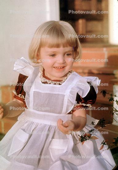 Smiling Girl, apron dress, 1950s