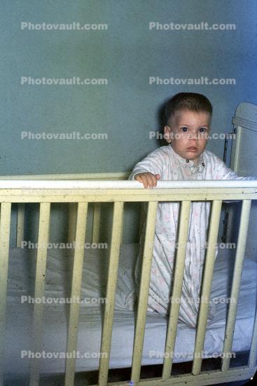 Toddler, cute, funny, smiles, crib, June 1960, 1960s