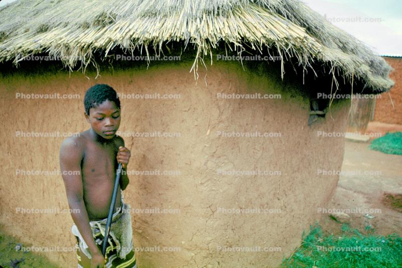 Boy, Male, grass thatched roof, building, Sod