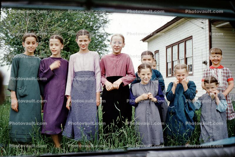 giggling girls, smiling, Pennsylvania, Amish, smiles, 1950s