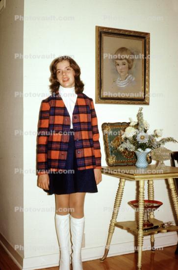 Teen Girl Stands next to her Portrait Painting, 1960s