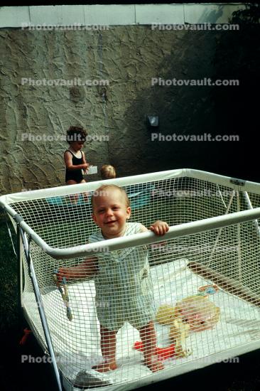 Toddler in a Crib, playpen, 1950s