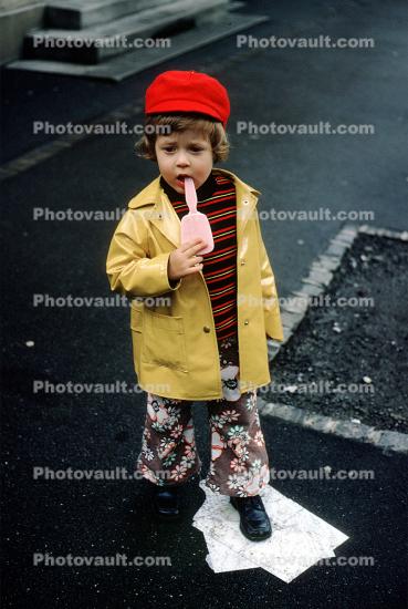 Girl, Jacket, hat, raincoat, flowery bell bottom pants, boots, William Tell Monument, Altdorf, Switzerland, June 1971, 1970s
