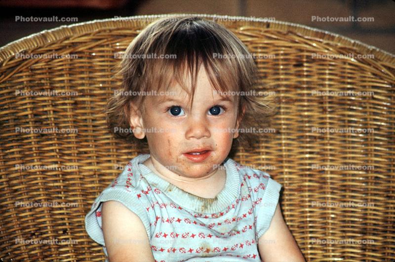 Girl, messy hair, muss, face, wicker chair, Erol, Gokyigit, July 1971, 1970s