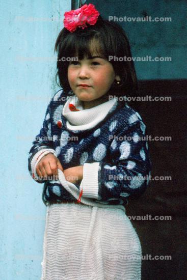 Girl standing, dress, sweater, Smarkand, Uzbekistan, 1950s