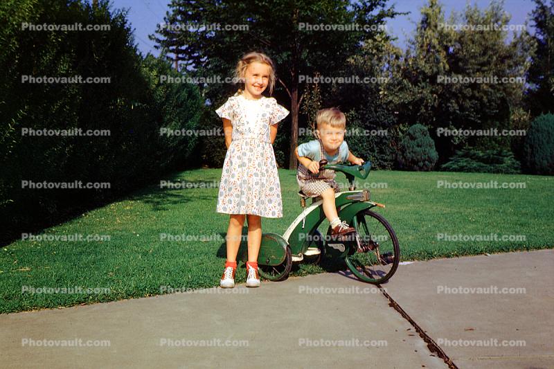 Tricycle, Gitl, Boy, lawn, 1950s