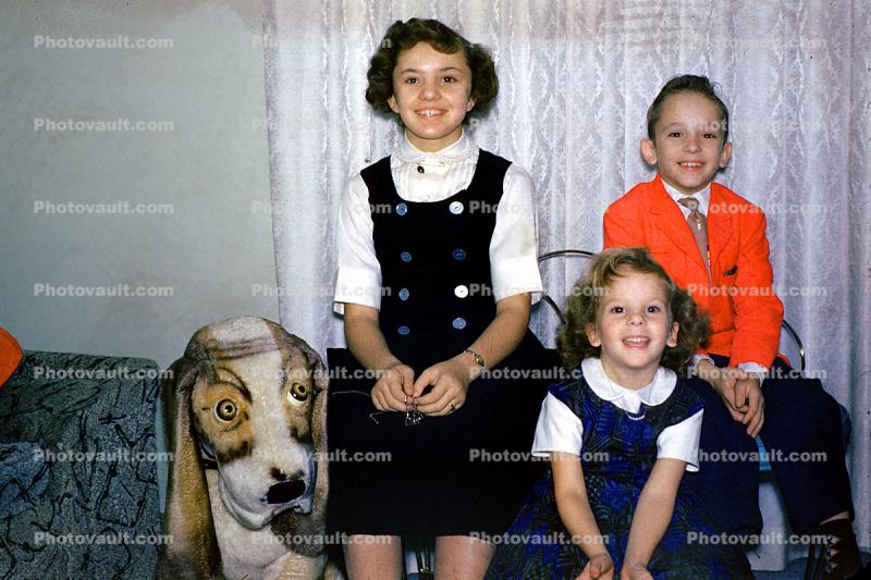 Siblings, brother, sisters, formal dress, tiara, smiles, 1950s
