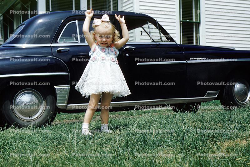 Cute little girl, dress, ribbon, tiara, 1951 Chrysler Windsor, Car, 1950s