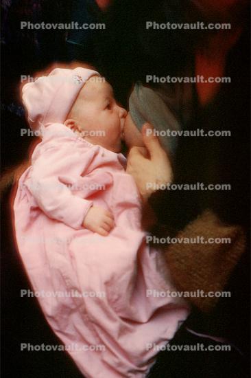 Nursing Baby Girl, newborn, breastfeeding, hat