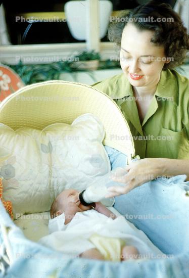 Mother Bottle Feeding, baby, newborn, bassinet, 1950s