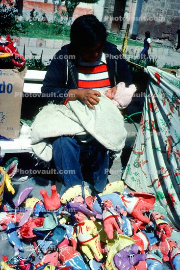 Woman, vendor, baby, April 1978, 1970s
