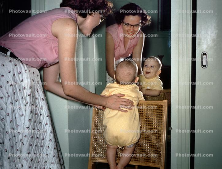 Toddler Laughing with Mom, Mother and her baby, child, 1950s