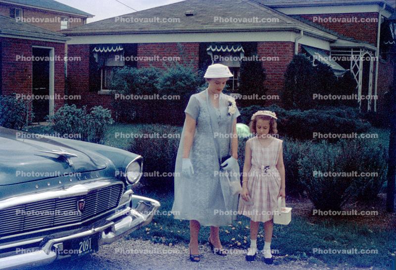 Mother and Daughter, formal dress, car, 1950s