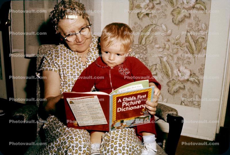 Baby Boy Reading "A Childs, First Picture Dictionary"