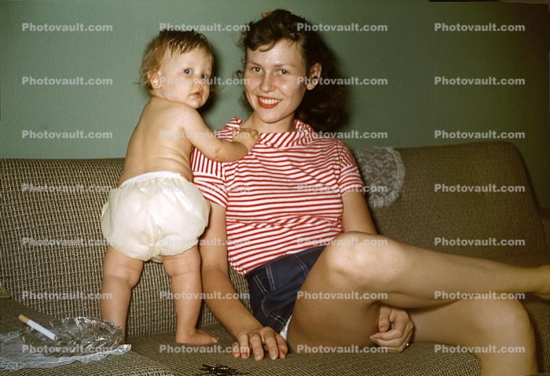 Mother and Baby Girl, legs, smiles