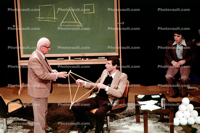 Tetrahedron, polyhedra, stage, chalkboard "Conversations with Buckminster Fuller" event, New York City