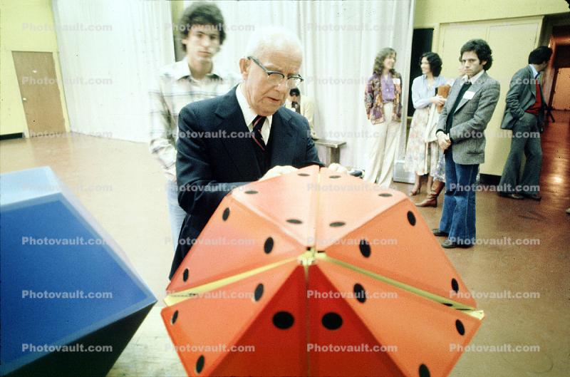 Icosahedron, Bucky preparing polyhedra models, "Conversations with Buckminster Fuller" event, Oakland, Polyhedra