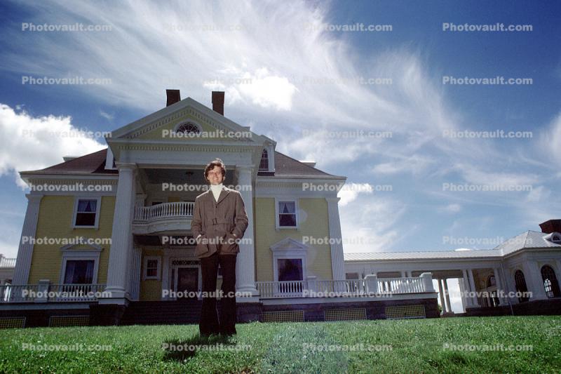 Portrait of Marshall Thurber, clouds, mansion, Burklyn Hall, Burke, Vermont, 1970s