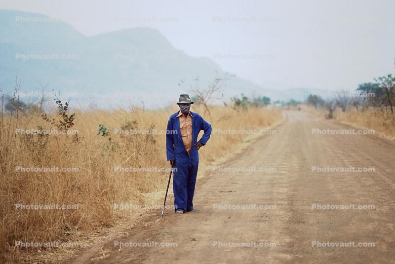 Man Standing on a Dirt Road, Zimbabwe