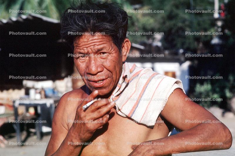 man, male, old, suntanned, outside, outdoors, exterior, guy, mature, senior citizen, face, smoker, cigarette, Yelapa, Mexico