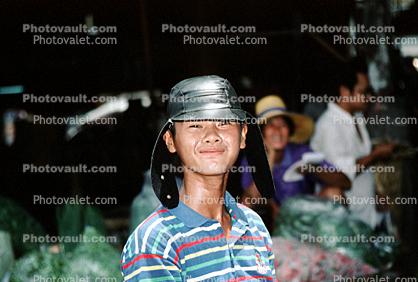 Asian, Man, smiles, hat
