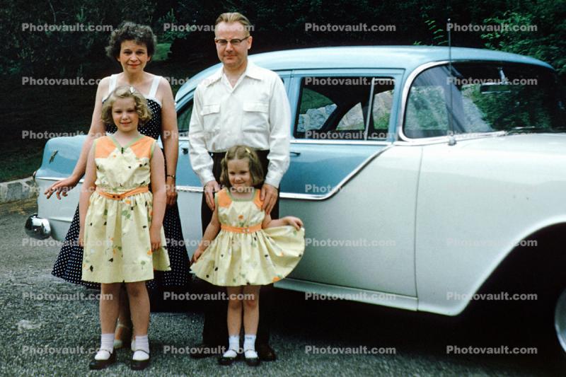 Mother, Father, Daughters, Oldsmobile Car, dresses, car, vehicle, automobile, 1950s