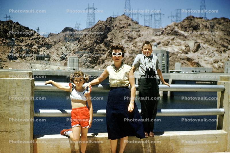 Mother, son, daughter, cateye glasses, 1940s
