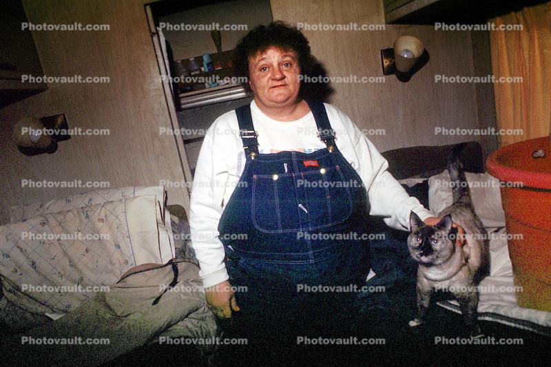 Fat Woman, overalls, cat, smiles
