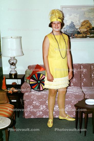 lady, feminine, female, woman, women, smile, Caucasian, mod, dress, necklace, couch, nylon stockings, hose, shoes, frilly skirt, sofa, lamp, Spring Sing Costume, Muncie Indiana, 1960s