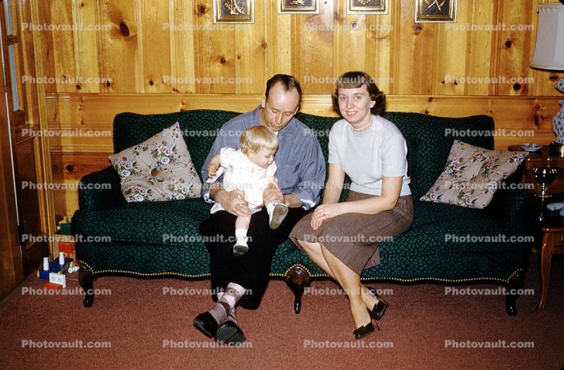 Mother, Father, Daughter, parents, sofa couch, pillows, March 1961, 1960s