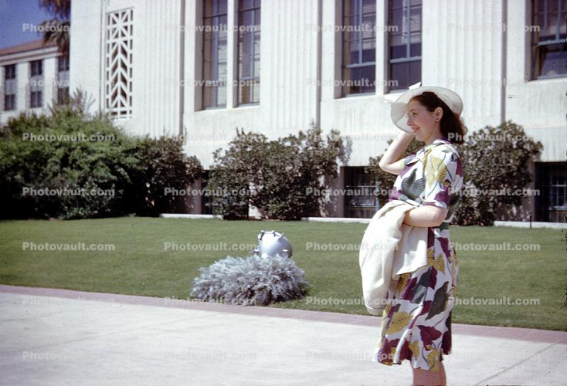 Windy, Windblown, Women, female, formal dress, hat, coat, lawn, March 1965, 1960s