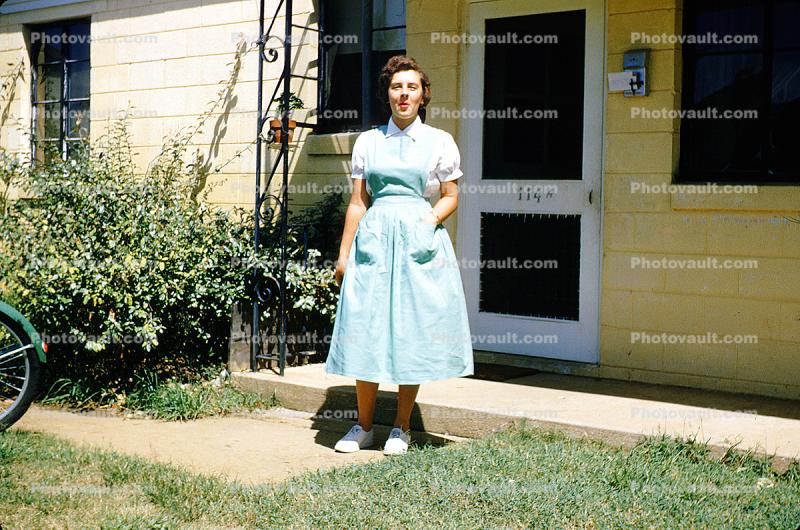 Woman, Front yard, female, home, house, 1950s
