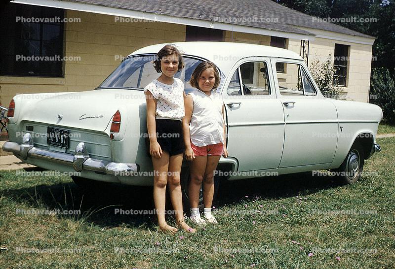 Girls, Sisters, siblings, Ford Consul, Shelton, car, automobile, sedan, Vehicle, Albany Georgia, September 5 1957, 1950s