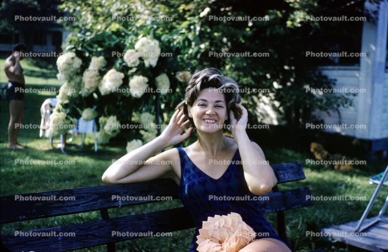Smiling Woman, backyard, bench, swimsuit, 1960s